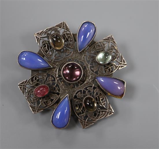 An early 20th century Arts & Crafts white metal and cabochon stone set brooch, in the manner of Sibyl Dunlop, 5cm, gross 24 grams.